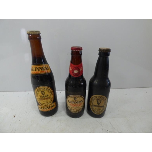 292 - Two Vintage Bottles of Guinness and one plastic bottle