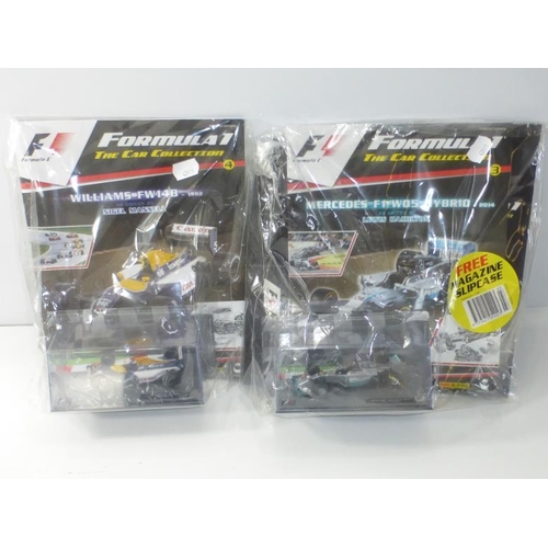 44 - Two Panini Formula 1 Model's and Magazines from The Car Collection