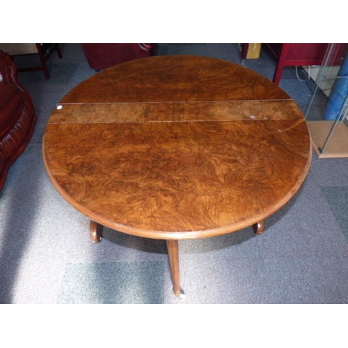 489 - Antique Burr Walnut Sutherland Drop Leaf Table Raised On Castors