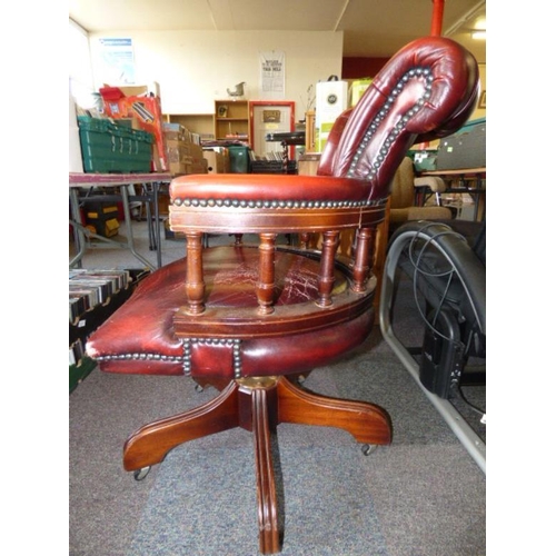 501 - Vintage Oxblood Red Leather Captains Chair on Casters