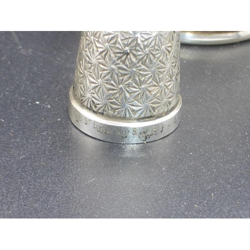 324 - Two Silver Thimbles and Two Sterling Silver Napkin Rings