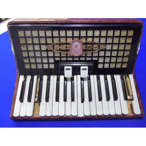123 - Russian Accordion Complete with Case- (no damage to bellows)