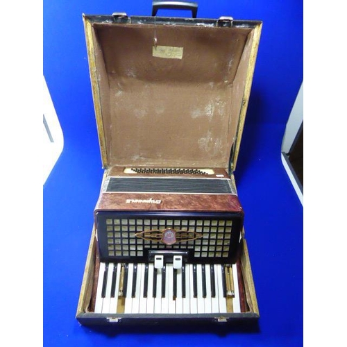 123 - Russian Accordion Complete with Case- (no damage to bellows)