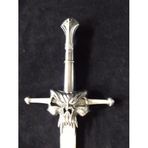 309 - Boxed Fantasy Skull Sword complete with stand