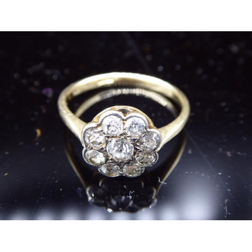 379 - Gold 18ct Diamond Flower Cluster Ring (Size T) Weight 4 grams