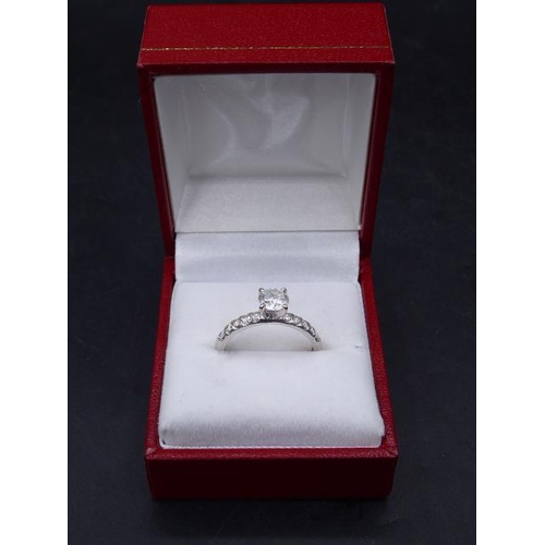 380 - Ladies 14ct White Gold Solitare Diamond Ring (Centre Stone 0.74ct, Sidestones 0.25ct) comes complete... 