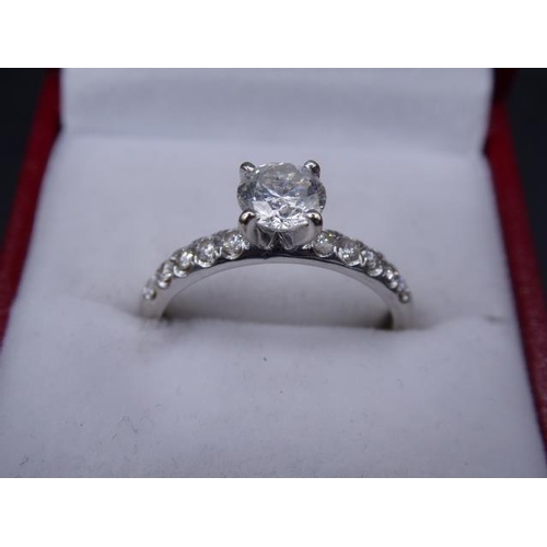 380 - Ladies 14ct White Gold Solitare Diamond Ring (Centre Stone 0.74ct, Sidestones 0.25ct) comes complete... 