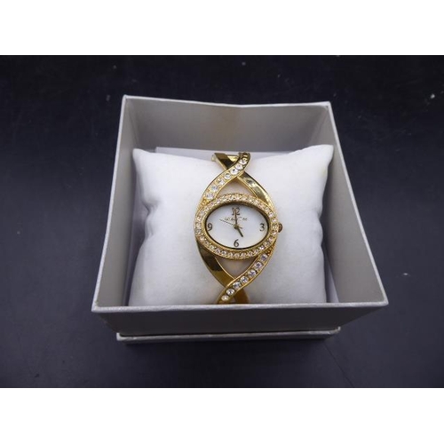 416 - Ladies Unique Time watch complete with box