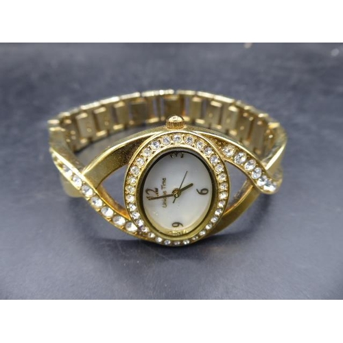 416 - Ladies Unique Time watch complete with box