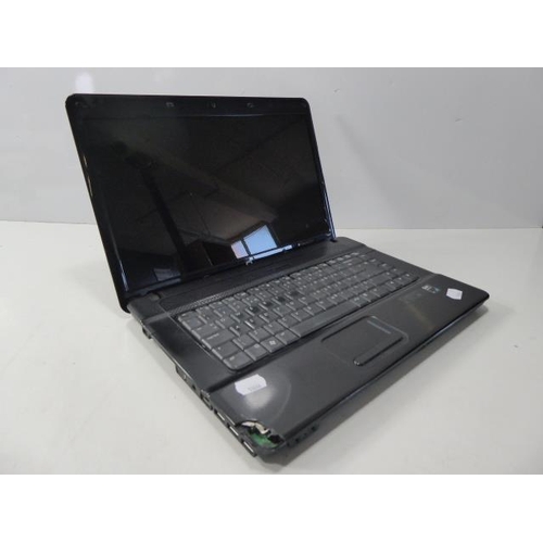 518 - Compaq Laptop model no 615, windows 10, comes complete with charger,  but has no battery. powers on ... 