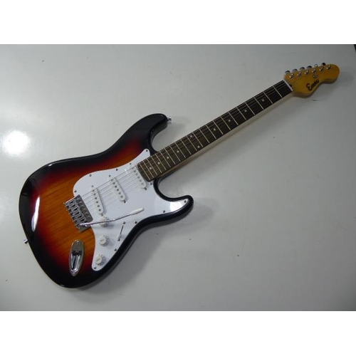 565 - Encore Stratocaster style guitar in sunburst finish. Comes with a tuner, strings, cable, instruction... 