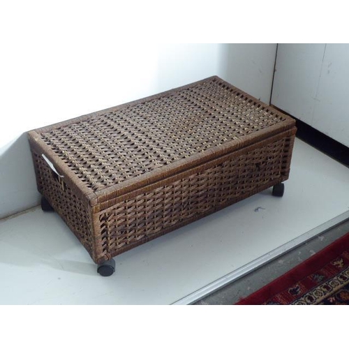 589 - Two wheeled Rattan storage boxes