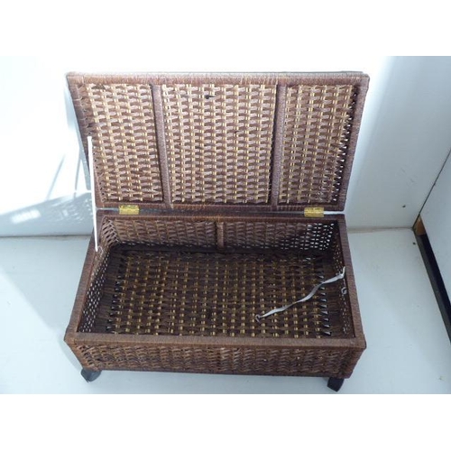 589 - Two wheeled Rattan storage boxes