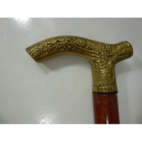 469 - Two Brass Handled Walking Sticks