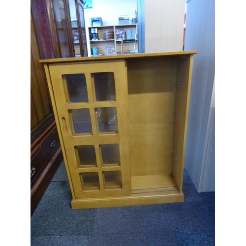 468 - Small book case with sliding glass fronted doors and cube design
