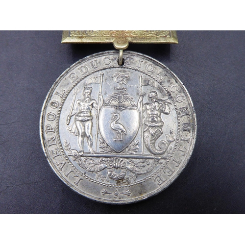 319 - 1904 Attendance & Good Conduct Medal with ribbon