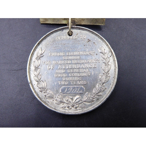 319 - 1904 Attendance & Good Conduct Medal with ribbon