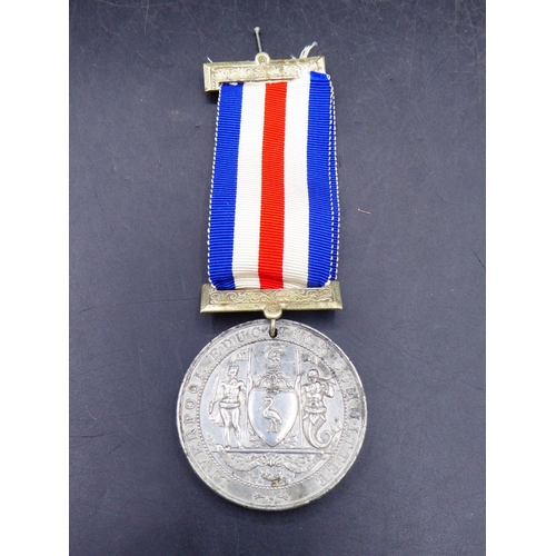 319 - 1904 Attendance & Good Conduct Medal with ribbon