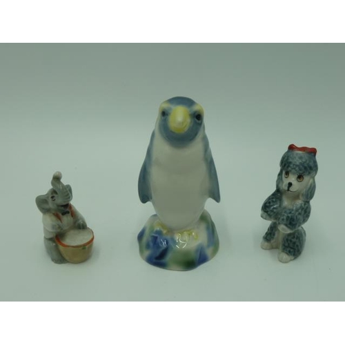 205 - Selection of Wade Figures including Penguin Decanter and Lady and the Tramp