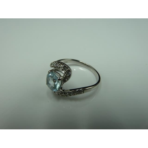 265 - Hallmarked Birmingham Silver 925 ring with clear stone with blue tint in presentation box (size M)