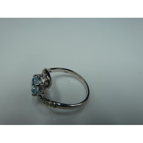 265 - Hallmarked Birmingham Silver 925 ring with clear stone with blue tint in presentation box (size M)