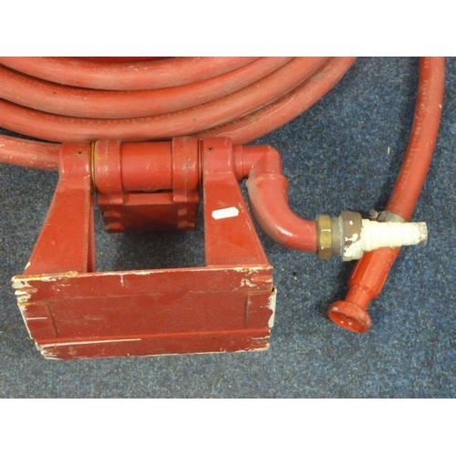 374 - Vintage fire hose reel complete with wall bracket