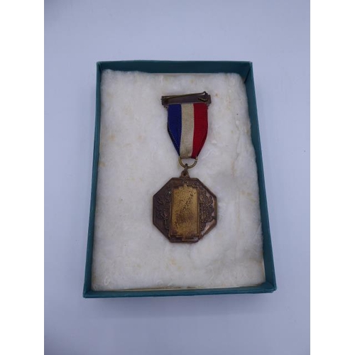 299 - King George V and Queen Mary Silver Jubilee Medal 1935