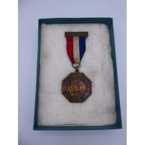 299 - King George V and Queen Mary Silver Jubilee Medal 1935