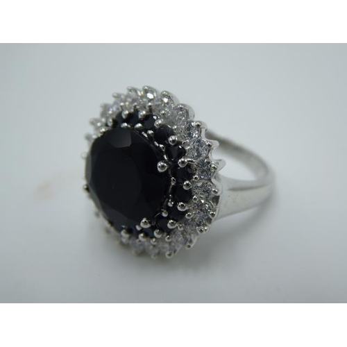 303 - Hallmarked Birmingham Silver 925 ring with Black centre Stone in presentation box (size L)