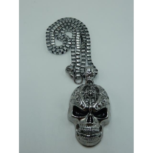 327 - Skulls Head Bracelet together with Pendant and Chain