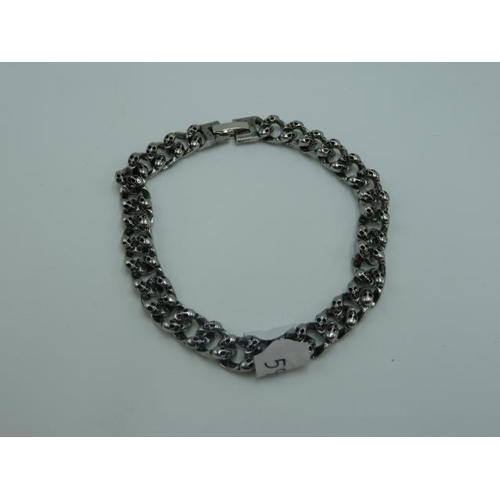 327 - Skulls Head Bracelet together with Pendant and Chain