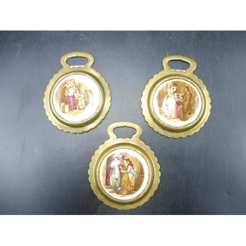 79 - Three horse brasses with ceramic inserts