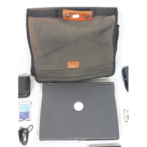 148 - Laptop complete with accessories and bag