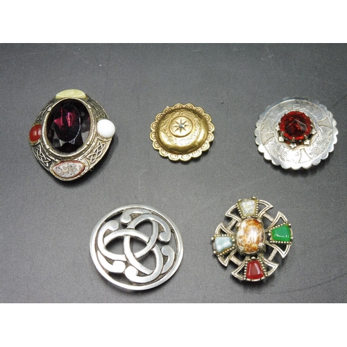 256 - Five various Brooches to include Silver, Celtic and Other