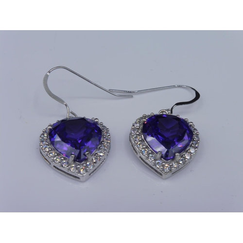 265 - Pair of Silver 925 Purple stone heart shaped earrings in presentation box