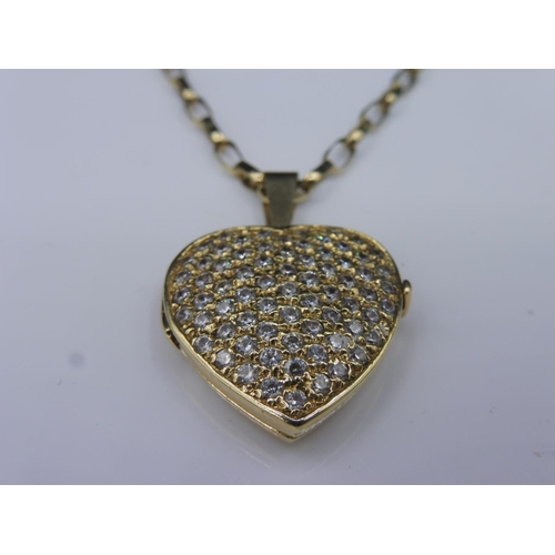 289 - Hallmarked Gold 375 encrusted Heart Shaped Locket complete with Chain (10.85 grams)