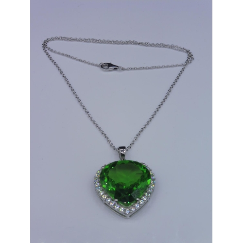 301 - Silver 925 green stone heart shaped pendant on chain in presentation box