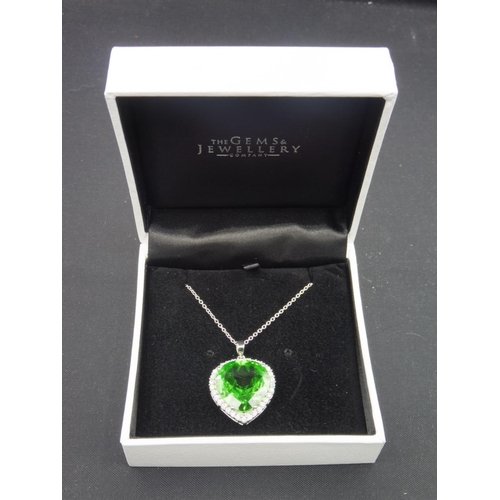 301 - Silver 925 green stone heart shaped pendant on chain in presentation box