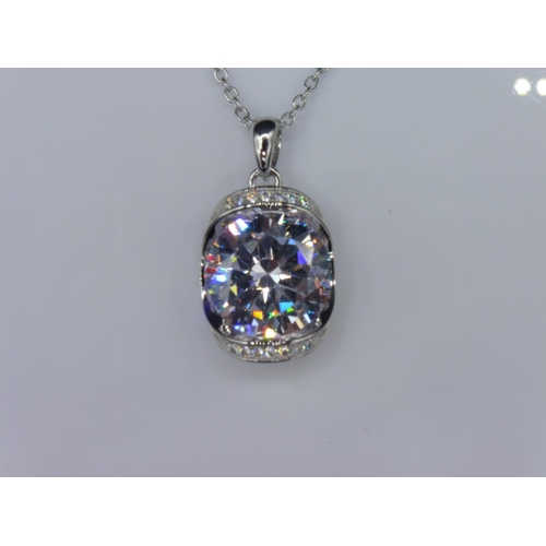 313 - Silver 925 clear stone pendant on chain in presentation box