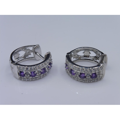 333 - Pair of Silver purple stone earrings in presentation box