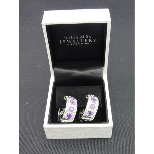 333 - Pair of Silver purple stone earrings in presentation box