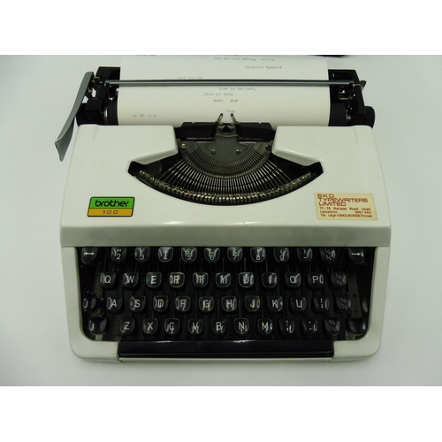 512 - Brother 100 manual Typewriter in carry case