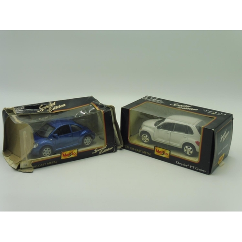 110 - Two Boxed Maisto Vehicles to include Chrysler PT cruiser