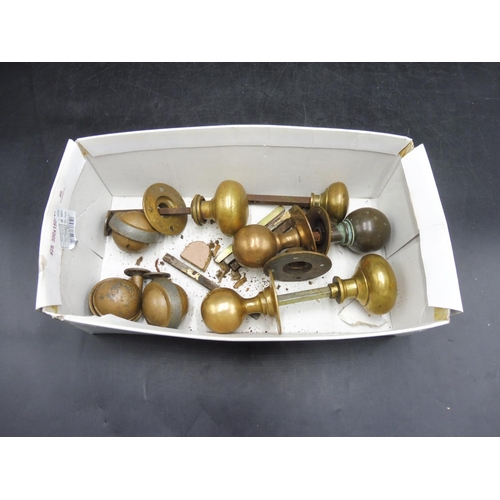 130 - Box of brass Door handles and other