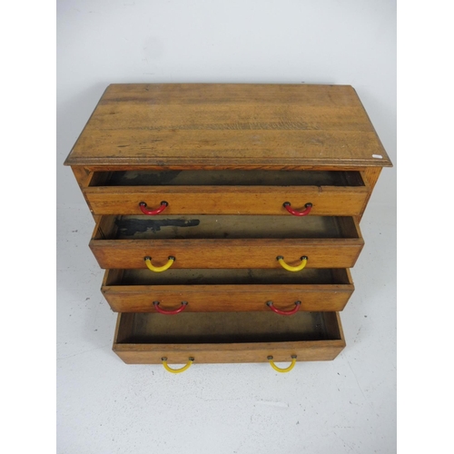 174 - Sold Oak Four Drawer Bedroom Furniture with Yellow and Red Handles 27.5