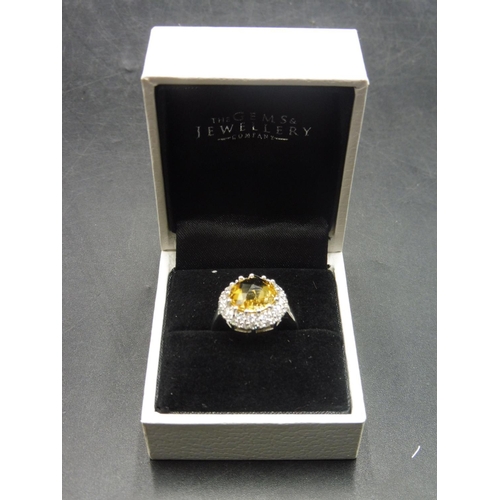 290 - Hallmarked Birmingham Silver 925 Ring with Citrine Stone set in Diamante Setting complete with prese... 