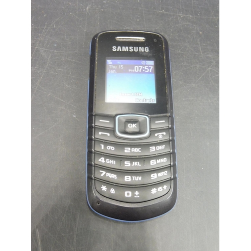 12 - Samsung Mobile Phone complete with charger and box