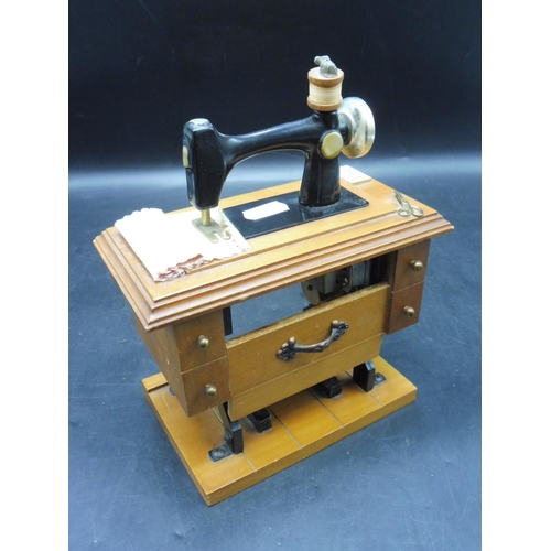 93 - Wind up Sewing machine Music Box playing Buttons and Bows approx 8.5