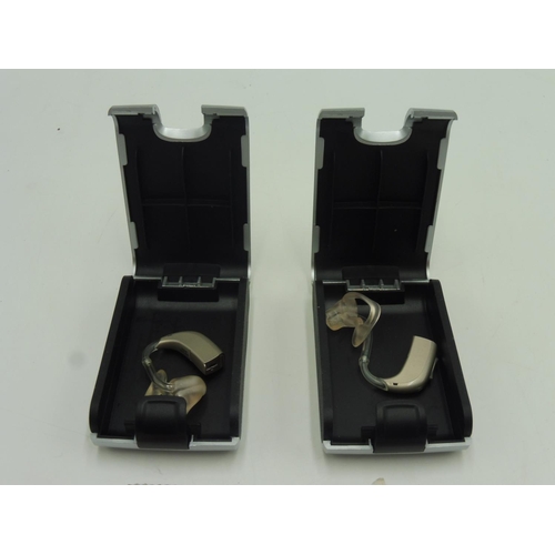 144 - Pair of Oticon Hearing Aids