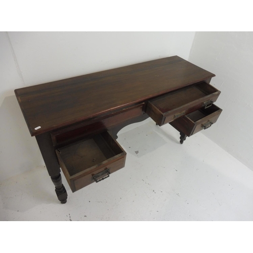 526 - Antique Solid Oak Four Drawer Desk on Casters 35.5